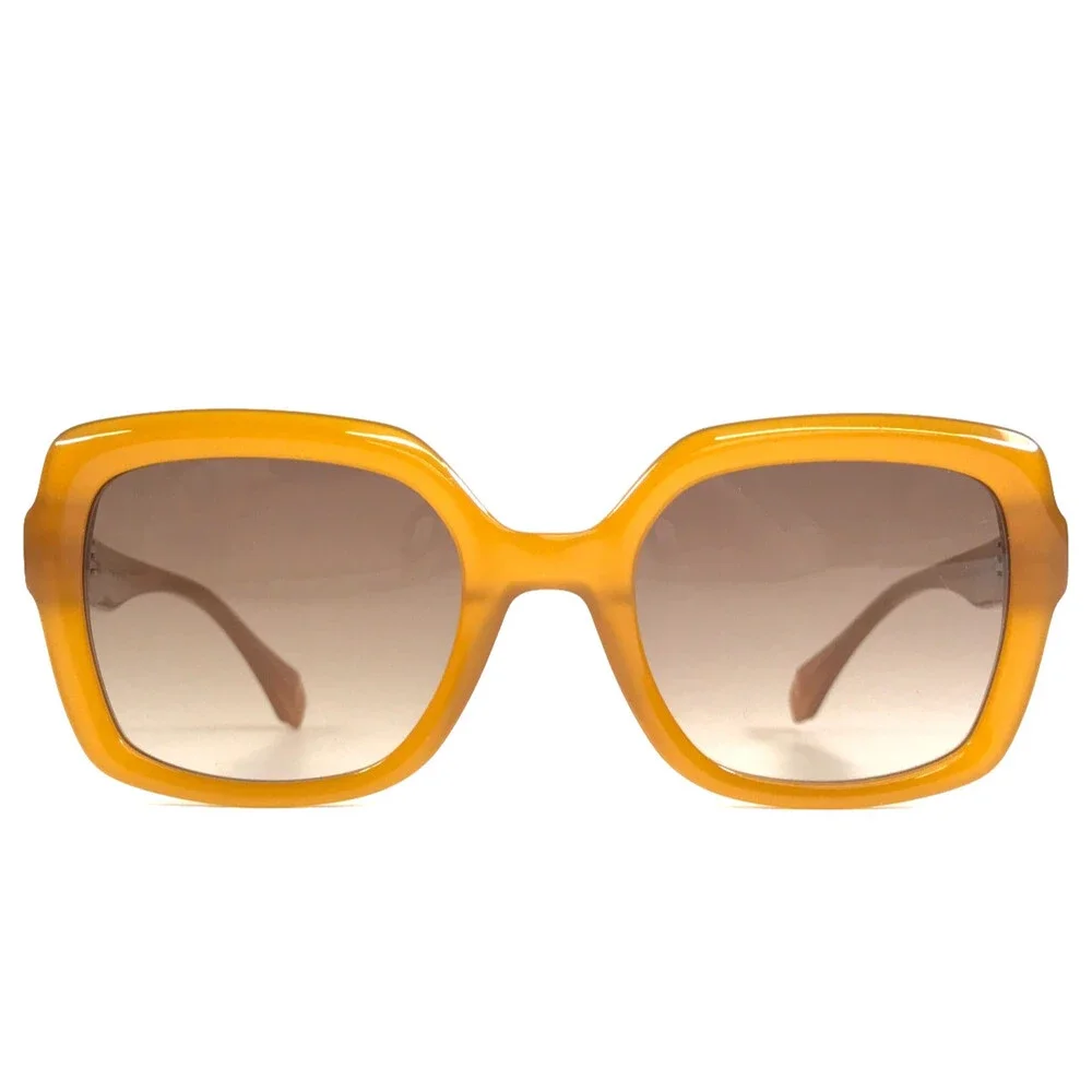 Gigi Studios Sunglasses GENESIS 6934/5 Amber Honey Frames Brown Gradient Lenses